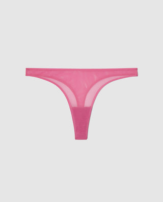 Foto de Subject shot of pink mesh thongs with vent hole in the